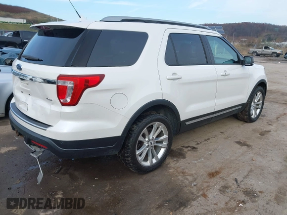 2018 Ford Explorer XLT z VIN 1FM5K8D82JGB40991, wystawiony jako IAAI lot #40883365 z przebiegiem 92 183 mil mil oraz . Historia ofert i sprzedaży dostępna na DreamBid. Obrazek 4.