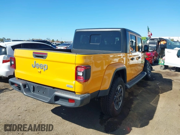 2021 Jeep Gladiator Overland z VIN 1C6HJTFG3ML552660, wystawiony jako IAAI lot #41636232 z przebiegiem 37 769 mil mil oraz . Historia ofert i sprzedaży dostępna na DreamBid. Obrazek 4.
