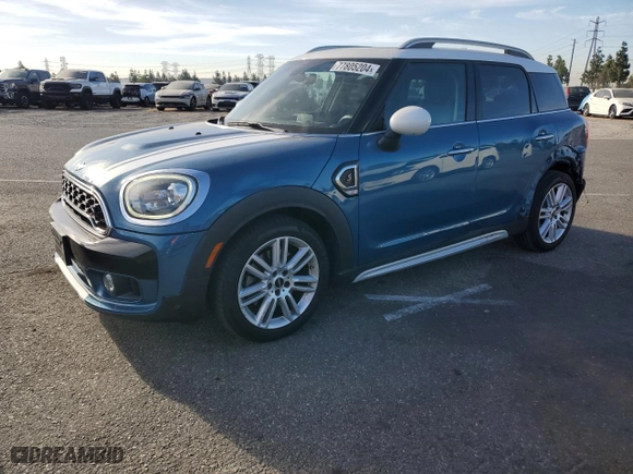 2017 MINI Countryman Cooper S with VIN WMZYT3C37H3B66319, listed as a Copart auction lot 77805204 with 65,452 mi miles and Salvage Title. Bid and sale history available at carsss.com. Image 1.
