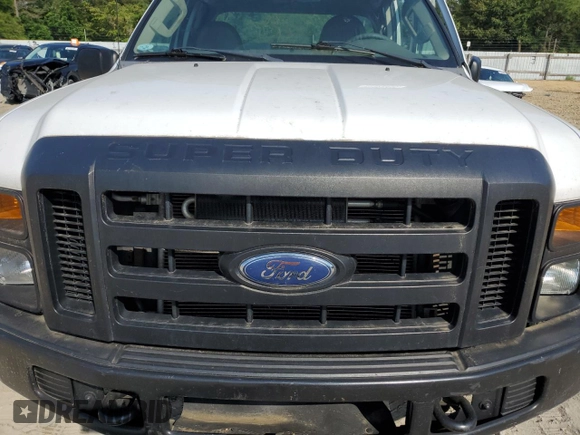 2008 Ford F-250 XL with VIN 1FDSX20558ED20386, listed as a Copart auction lot 61328455 with 111,449 mi miles and Salvage title. Bid and sale history available at DreamBid. Image 11.
