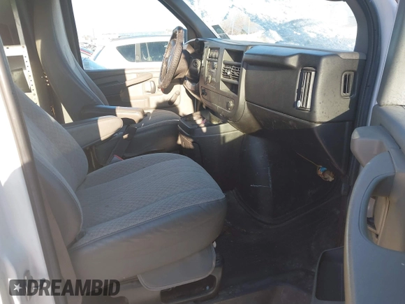 2012 Chevrolet Express Cargo Van with VIN 1GCWGGBA0C1100411, listed as a IAAI auction lot 41024219 with 197,251 mi miles. Bid and sale history available at carsss.com. Image 5.