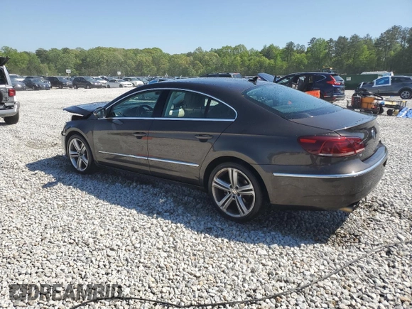 2013 Volkswagen CC Sport Plus z VIN WVWBP7AN7DE515951, wystawiony jako Copart lot #52251575 z przebiegiem 121 414 mil mil oraz Szkody całkowita. Historia ofert i sprzedaży dostępna na DreamBid. Obrazek 2.