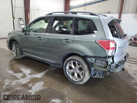 2017 Subaru Forester Touring with VIN JF2SJAWC5HH572306, listed as a Copart auction lot 63699995 with Not provided miles and Salvage title. Bid and sale history available at DreamBid. Image 2.