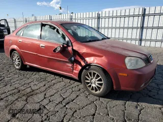 2005 Suzuki Forenza Premium z VIN KL5JJ56Z65K093127, wystawiony jako Copart lot #87691665 z przebiegiem 178 868 mil mil oraz Szkody całkowita. Historia ofert i sprzedaży dostępna na DreamBid. Obrazek 4.