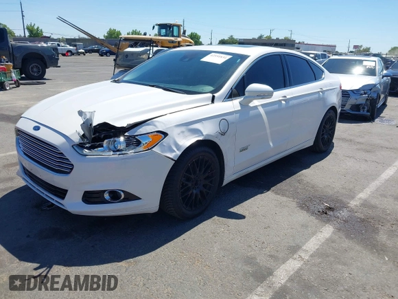 2016 Ford Fusion Titanium z VIN 3FA6P0SU2GR357508, wystawiony jako IAAI lot #42551834 z przebiegiem 177 425 mil mil oraz . Historia ofert i sprzedaży dostępna na DreamBid. Obrazek 2.