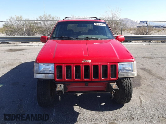1996 Jeep Grand Cherokee Limited with VIN 1J4GZ78Y0TC376265, listed as a Copart auction lot 52124345 with 205,676 mi miles and Salvage Title. Bid and sale history available at carsss.com. Image 5.