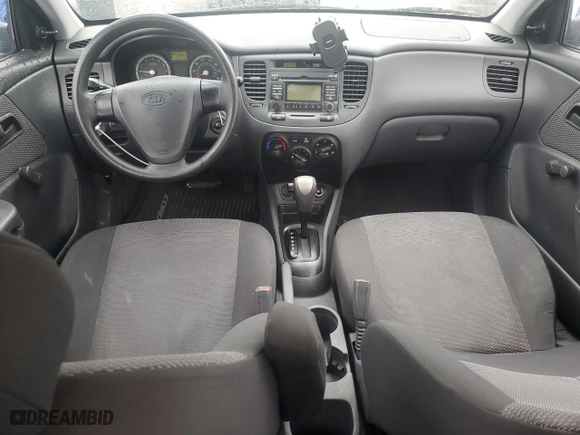 2009 Kia Rio SX with VIN KNADE223896572348, listed as a Copart auction lot 51949235 with 161,546 mi miles and Salvage Title. Bid and sale history available at carsss.com. Image 8.