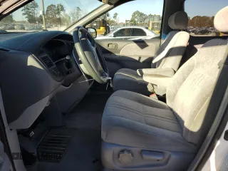 2000 Toyota Sienna LE with VIN 4T3ZF13C5YU201708, listed as a Copart auction lot 83924024 with 219,940 mi miles and Salvage Title. Bid and sale history available at carsss.com. Image 7.