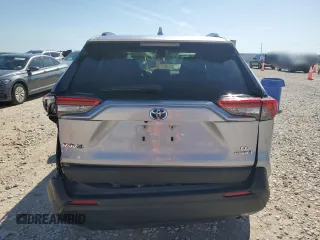2023 Toyota RAV4 Hybrid LE with VIN JTMLWRFV0PD207803, listed as a Copart auction lot 55694695 with 13,198 mi miles and Salvage title. Bid and sale history available at DreamBid. Image 6.