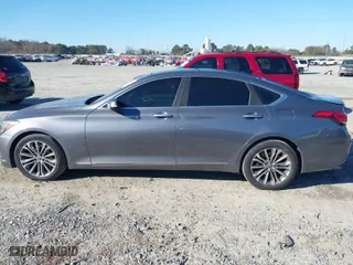 2015 Hyundai Genesis 3.8L with VIN KMHGN4JE4FU014997, listed as a IAAI auction lot 41166300 with 220,328 mi miles. Bid and sale history available at carsss.com. Image 14.