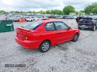 2003 Hyundai Accent GL z VIN KMHCG35CX3U247788, wystawiony jako IAAI lot #42254692 z przebiegiem 89 560 mil mil oraz . Historia ofert i sprzedaży dostępna na DreamBid. Obrazek 4.