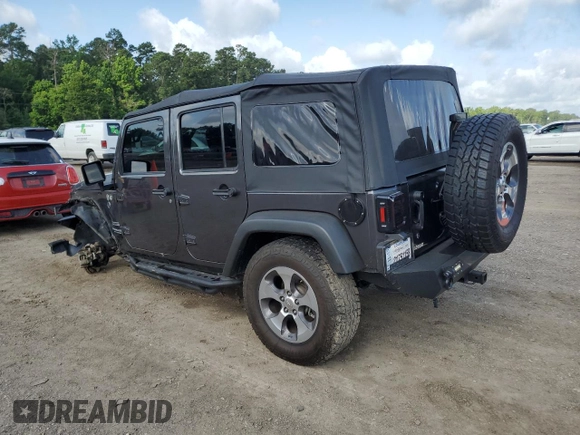 2017 Jeep Wrangler Unlimited Sport with VIN 1C4BJWDG8HL680627, listed as a Copart auction lot 61241735 with 100,890 mi miles and Salvage title. Bid and sale history available at DreamBid. Image 2.