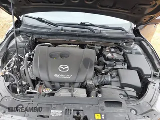 2017 Mazda 3 Touring z VIN JM1BN1V77H1101001, wystawiony jako IAAI lot #41393592 z przebiegiem 77 566 mil mil oraz . Historia ofert i sprzedaży dostępna na DreamBid. Obrazek 10.