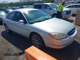 2003 Ford Taurus SE Standard with VIN 1FAFP53U83A166112, listed as a IAAI auction lot 41945480 with 173,593 mi miles. Bid and sale history available at carsss.com. Image 1.