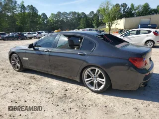 2013 BMW 7 Series 750Li xDrive with VIN WBAYF8C57DD140694, listed as a Copart auction lot 56983435 with 113,444 mi miles and Salvage title. Bid and sale history available at DreamBid. Image 2.