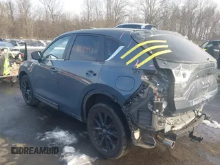 2021 Mazda CX-5 Touring z VIN JM3KFBCMXM0463469, wystawiony jako IAAI lot #41488993 z przebiegiem 28 582 mil mil oraz . Historia ofert i sprzedaży dostępna na DreamBid. Obrazek 3.