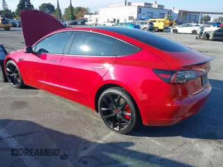 2021 Tesla Model 3 Performance with VIN 5YJ3E1EC9MF926301, listed as a IAAI auction lot 40959721 with 28,094 mi miles and . Bid and sale history available at DreamBid. Image 3.