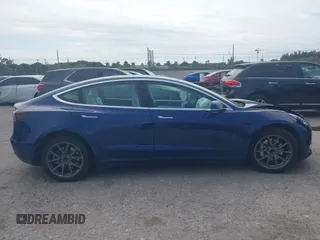 2020 Tesla Model 3 Standard Range Plus with VIN 5YJ3E1EA7LF785838, listed as a IAAI auction lot 41586081 with 38,392 mi miles and . Bid and sale history available at carsss.com. Image 13.