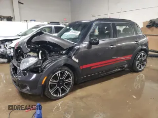 2015 MINI Countryman S z VIN WMWZC3C57FWT05845, wystawiony jako Copart lot #51644685 z przebiegiem 62 606 mil mil oraz Szkody całkowita. Historia ofert i sprzedaży dostępna na DreamBid. Obrazek 1.