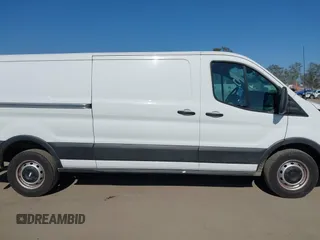2020 Ford Transit Cargo with VIN 1FTBR1Y83LKA67103, listed as a IAAI auction lot 42408599 with 76,837 mi miles and . Bid and sale history available at DreamBid. Image 13.