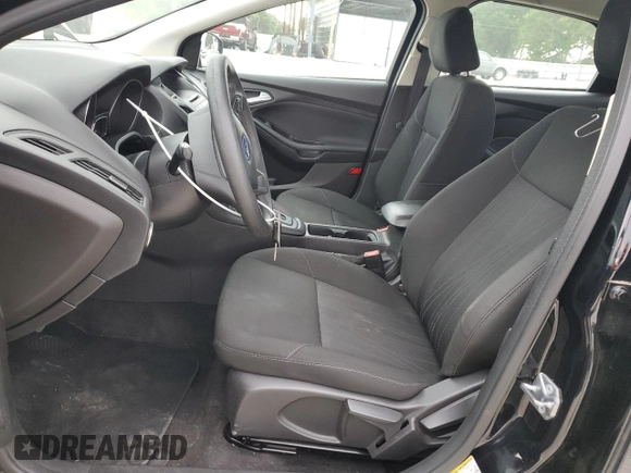 2017 Ford Focus SE with VIN 1FADP3F22HL291799, listed as a Copart auction lot 53789195 with 81,646 mi miles and Salvage title. Bid and sale history available at DreamBid. Image 7.