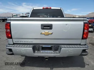 2018 Chevrolet Silverado 1500 Custom with VIN 3GCPCPEH0JG134579, listed as a Copart auction lot 50581845 with 125,133 mi miles and Salvage Title. Bid and sale history available at DreamBid. Image 6.