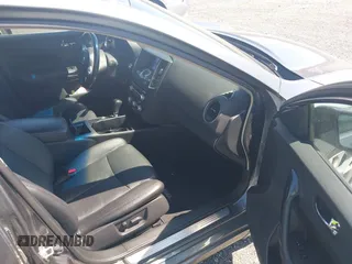 2014 Nissan Maxima SV with VIN 1N4AA5AP1EC458409, listed as a IAAI auction lot 42056758 with 103,570 mi miles and . Bid and sale history available at DreamBid. Image 5.