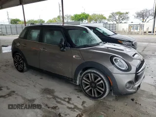 2021 MINI Hardtop 4 Door Cooper S z VIN WMWXU9C0XM2M90621, wystawiony jako Copart lot #52513635 z przebiegiem 57 419 mil mil oraz Szkoda całkowita • Salvage title. Historia ofert i sprzedaży dostępna na DreamBid. Obrazek 4.