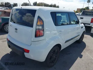 2011 Kia Soul + with VIN KNDJT2A21B7722613, listed as a IAAI auction lot 42054581 with 130,482 mi miles. Bid and sale history available at carsss.com. Image 4.