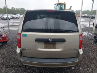 2009 Dodge Grand Caravan SE z VIN 2D8HN44E59R585342, wystawiony jako IAAI lot #42241676 z przebiegiem 329 636 mil mil oraz . Historia ofert i sprzedaży dostępna na DreamBid. Obrazek 16.