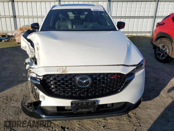 2022 Mazda CX-5 2.5 Turbo with VIN JM3KFBAY7N0597010, listed as a Copart auction lot 83062114 with 18,136 mi miles and Salvage Title. Bid and sale history available at carsss.com. Image 5.