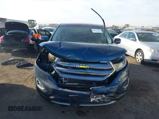 2016 Ford Edge SEL z VIN 2FMPK3J92GBB94624, wystawiony jako IAAI lot #41682327 z przebiegiem 106 232 mil mil oraz . Historia ofert i sprzedaży dostępna na DreamBid. Obrazek 13.