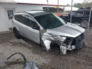 2018 Ford Escape SE z VIN 1FMCU9GD1JUB35184, wystawiony jako IAAI lot #41611285 z przebiegiem 142 267 mil mil oraz . Historia ofert i sprzedaży dostępna na DreamBid. Obrazek 1.