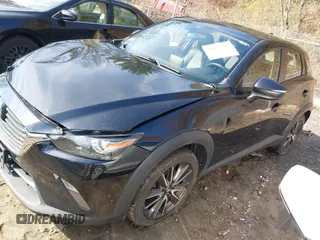 2017 Mazda CX-3 Touring with VIN JM1DKFC70H0171771, listed as a IAAI auction lot 41870395 with 100,472 mi miles. Bid and sale history available at carsss.com. Image 18.