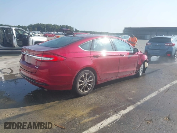 2017 Ford Fusion SE with VIN 3FA6P0HD7HR273404, listed as a IAAI auction lot 40993032 with 102,509 mi miles. Bid and sale history available at carsss.com. Image 4.