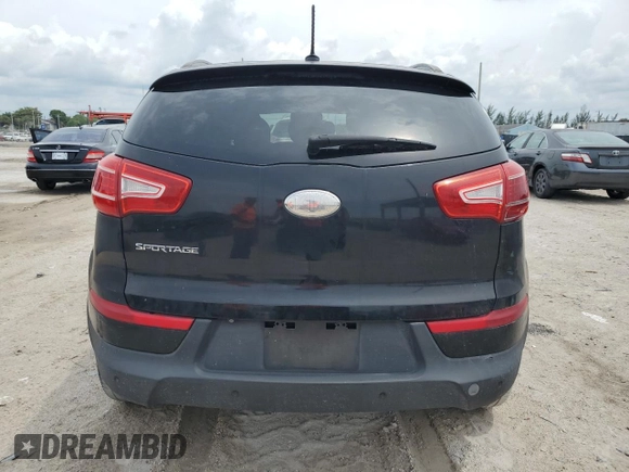 2013 Kia Sportage LX z VIN KNDPB3A20D7393554, wystawiony jako Copart lot #59036015 z przebiegiem 145 977 mil mil oraz Szkoda całkowita • Salvage title. Historia ofert i sprzedaży dostępna na DreamBid. Obrazek 6.