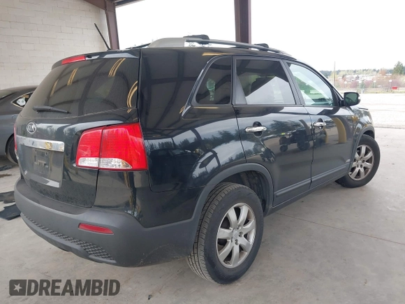 2011 Kia Sorento LX with VIN 5XYKTDA24BG170561, listed as a IAAI auction lot 42011756 with 211,833 mi miles. Bid and sale history available at carsss.com. Image 4.