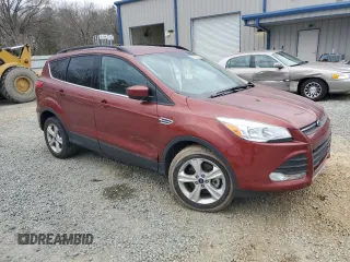 2016 Ford Escape SE with VIN 1FMCU0G94GUC18785, listed as a Copart auction lot 43554545 with 60,777 mi miles and Salvage Title. Bid and sale history available at carsss.com. Image 4.