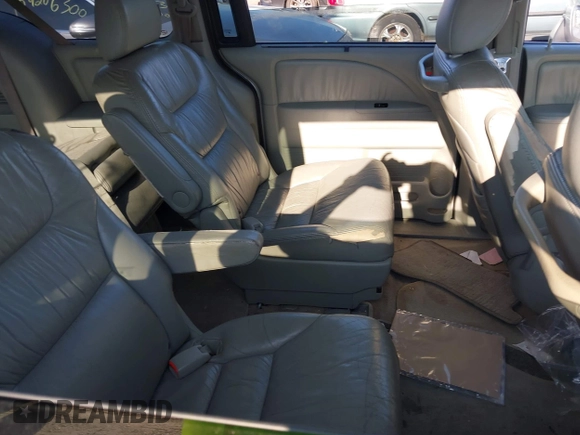 2008 Honda Odyssey EX-L with VIN 5FNRL38718B053448, listed as a IAAI auction lot 40182359 with 164,902 mi miles and . Bid and sale history available at DreamBid. Image 8.