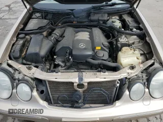 2000 Mercedes-Benz E-Class with VIN WDBJF82J0YX040071, listed as a Copart auction lot 50001165 with 145,638 mi miles and Salvage Title. Bid and sale history available at carsss.com. Image 11.