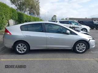 2010 Honda Insight EX with VIN JHMZE2H75AS003695, listed as a IAAI auction lot 42119429 with 90,901 mi miles and . Bid and sale history available at DreamBid. Image 13.