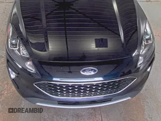 2021 Ford Escape SEL Hybrid with VIN 1FMCU9CZ0MUB25820, listed as a IAAI auction lot 42730204 with 66,443 mi miles and . Bid and sale history available at DreamBid. Image 1.
