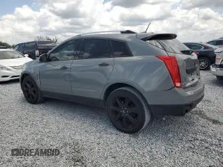 2014 Cadillac SRX Premium Collection z VIN 3GYFNGE30ES627895, wystawiony jako Copart lot #58605985 z przebiegiem 49 300 mil mil oraz Szkoda całkowita • Salvage title. Historia ofert i sprzedaży dostępna na DreamBid. Obrazek 2.