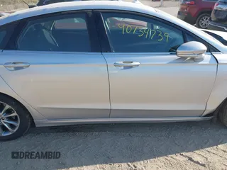2017 Ford Fusion SE z VIN 3FA6P0H73HR236618, wystawiony jako IAAI lot #40734739 z przebiegiem 189 000 mil mil oraz . Historia ofert i sprzedaży dostępna na DreamBid. Obrazek 13.