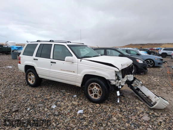 1996 Jeep Grand Cherokee Limited with VIN 1J4GZ78Y0TC185669, listed as a Copart auction lot 79032274 with 184,929 mi miles and Salvage Title. Bid and sale history available at carsss.com. Image 4.