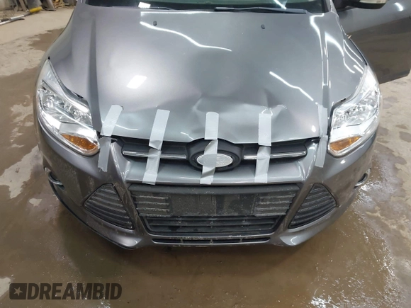 2014 Ford Focus SE with VIN 1FADP3F24EL310431, listed as a IAAI auction lot 41997295 with 108,718 mi miles. Bid and sale history available at carsss.com. Image 6.