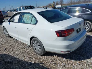 2016 Volkswagen Jetta Sedan 1.4T S w/Technology with VIN 3VW267AJ5GM249423, listed as a IAAI auction lot 41867790 with 61,979 mi miles. Bid and sale history available at carsss.com. Image 3.