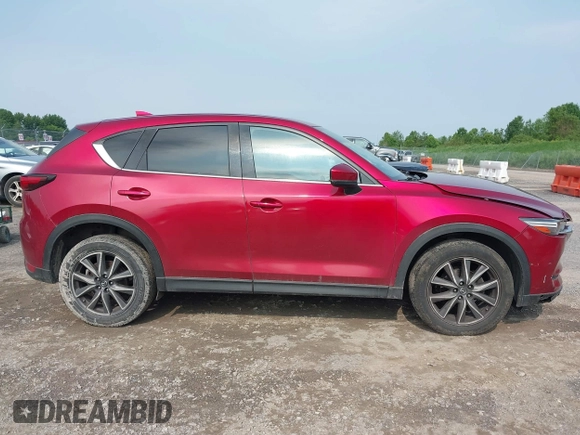 2018 Mazda CX-5 Grand Touring with VIN JM3KFBDM2J0448555, listed as a IAAI auction lot 42449282 with 65,770 mi miles and . Bid and sale history available at DreamBid. Image 14.
