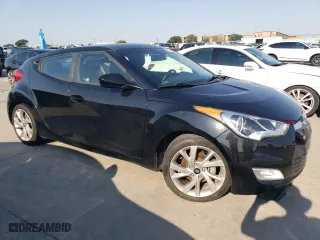 2017 Hyundai Veloster with VIN KMHTC6ADXHU306731, listed as a Copart auction lot 63019084 with 81,957 mi miles and Clean Title. Bid and sale history available at carsss.com. Image 4.