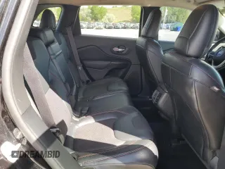 2014 Jeep Cherokee Trailhawk z VIN 1C4PJMBS1EW239692, wystawiony jako Copart lot #57153065 z przebiegiem 111 899 mil mil oraz Szkoda całkowita • Salvage title. Historia ofert i sprzedaży dostępna na DreamBid. Obrazek 11.